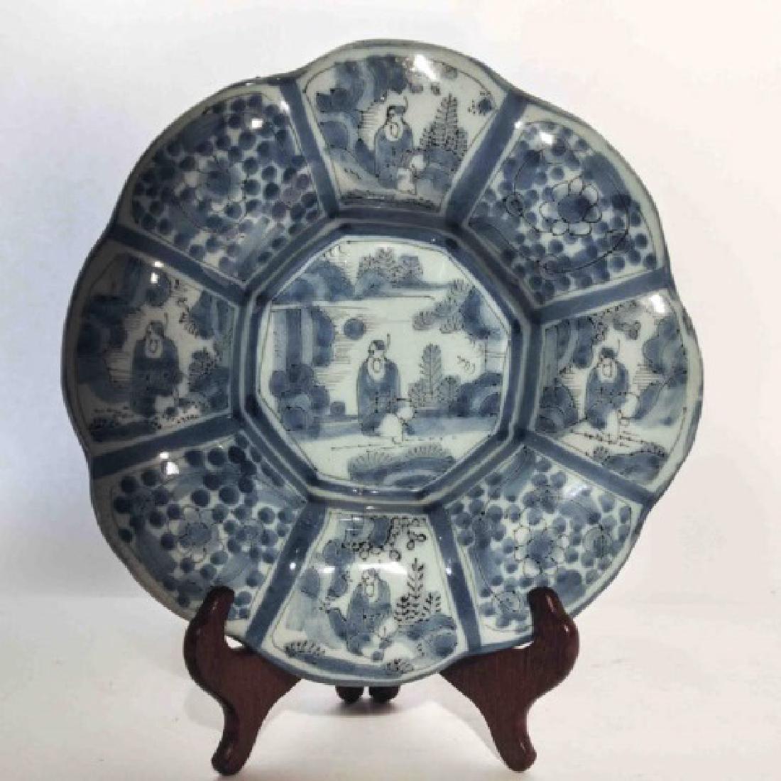 17th Century German Faience Blue Lobed Dish: German faience lobed blue and white dish c.1700, decorated in under glaze blue in the Chinese Transitional style..Lobed Dish, Frankfurt factory: Manganese group, late 17th century.