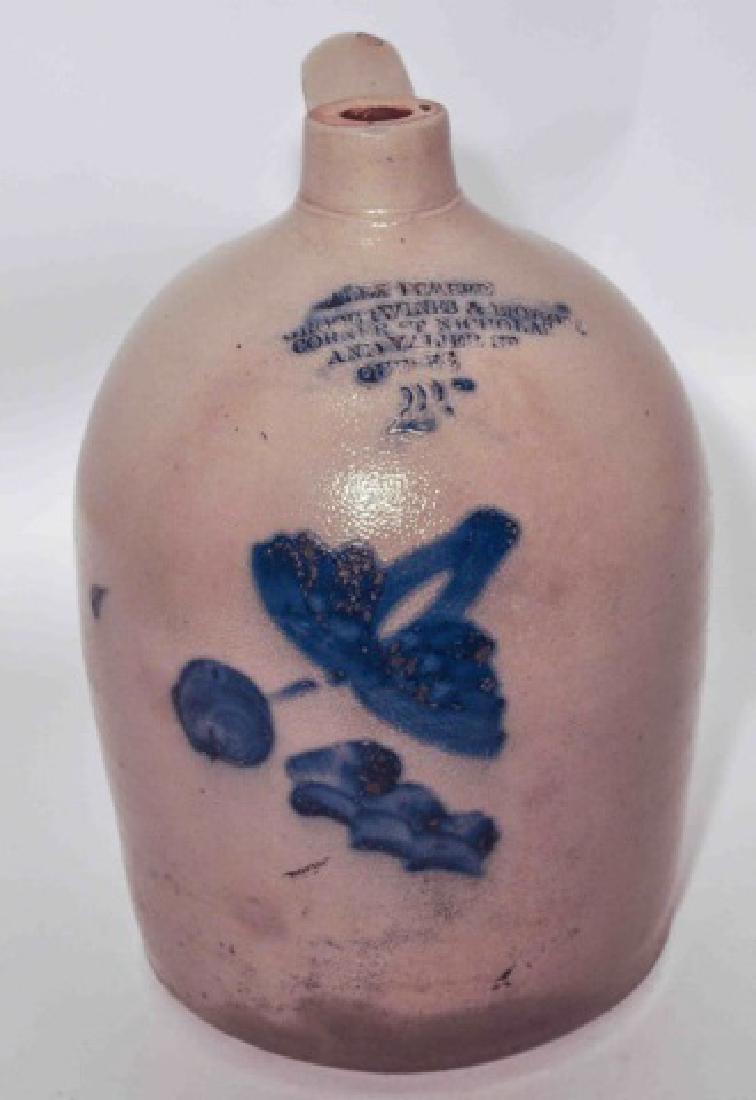 Antique Blue Decorated Salt Glazed Stoneware Jug: Wonderful 19c. salt glazed stoneware jug with Vibrant Cobalt Blue floral on front. Jug is labeled "Alex Fraser Grocer Wines & Liquors Corner St. Nicholas and Valier St. Quebec" The number "2" is stamp