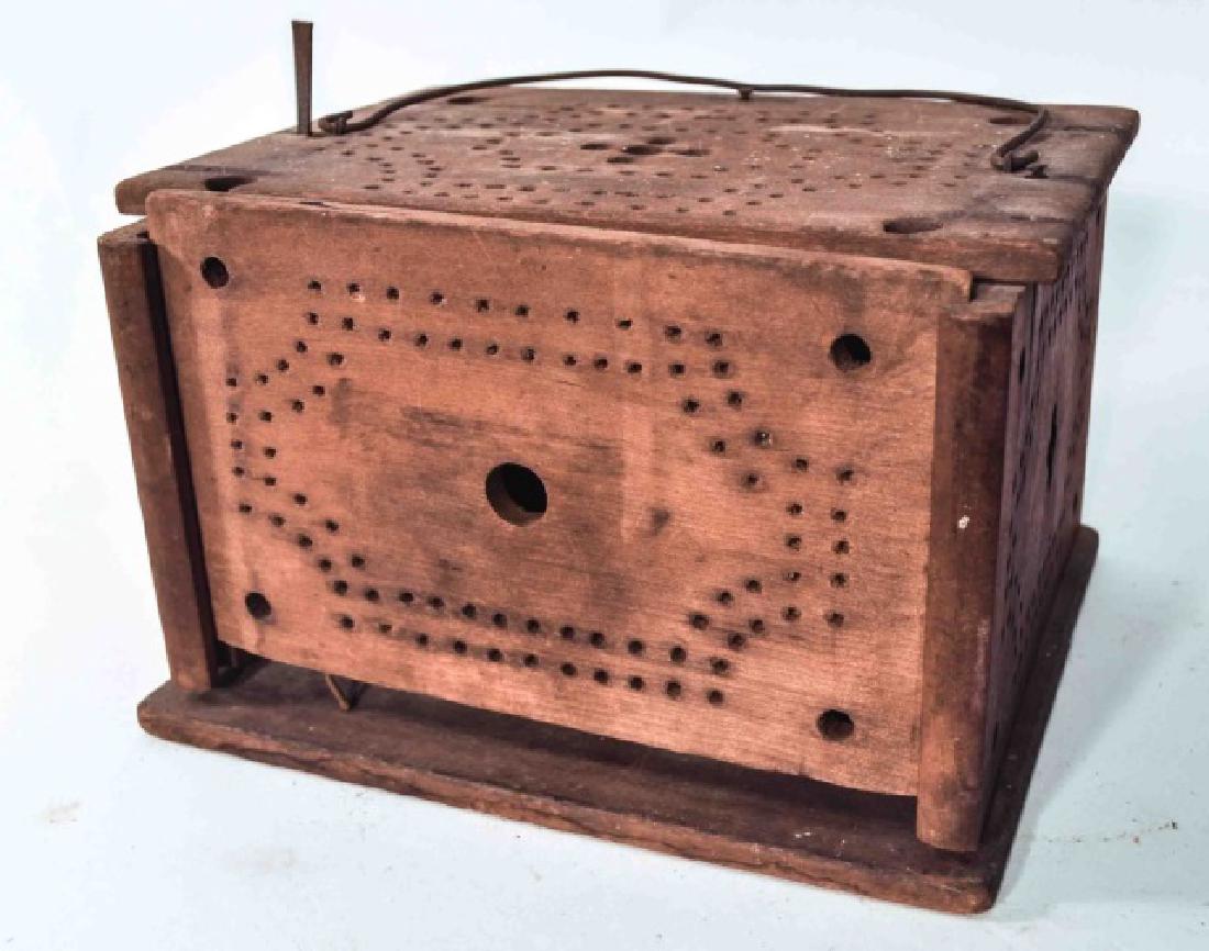 Early Primitive Antique Pierced Wood Foot Warmer: Early primitive antique pierced wood foot warmer. Remains in good condition, missing coal pan with minor losses. Original surface. Measures 10-3/4 inches by 8-1/2 inches by 6-1/2 inches tall.