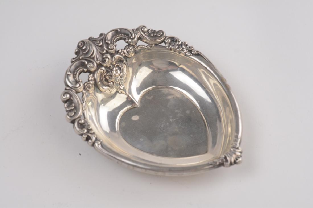 Sterling Grand Baroque Repousee Heart Nut Dish: Grand Baroque Heart Shaped Repousee Nut Dish. Marked Wallace Sterling Silver 4850-9 .Measures: 6" tall x 4-1/2 wide. Weight 2.29 troy oz. (KG-5)
