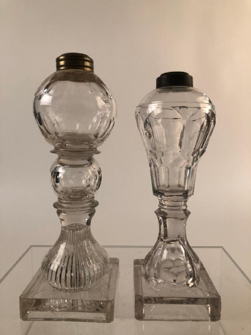Wonderful Pair of Pittsburgh Cut Whale Oil Lamps: Great pair of Pittsburgh Cut Glass oil lamps. Patterned polished fonts, brass collars. Small crack on base other than that in good condition. Measures Approx. 9-10" Tall. CP-111)