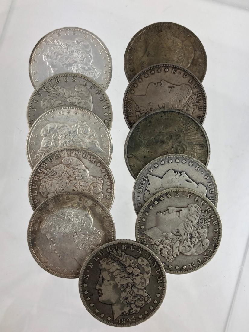 Eleven US Silver Morgan/Peace Dollars (1 of 3)