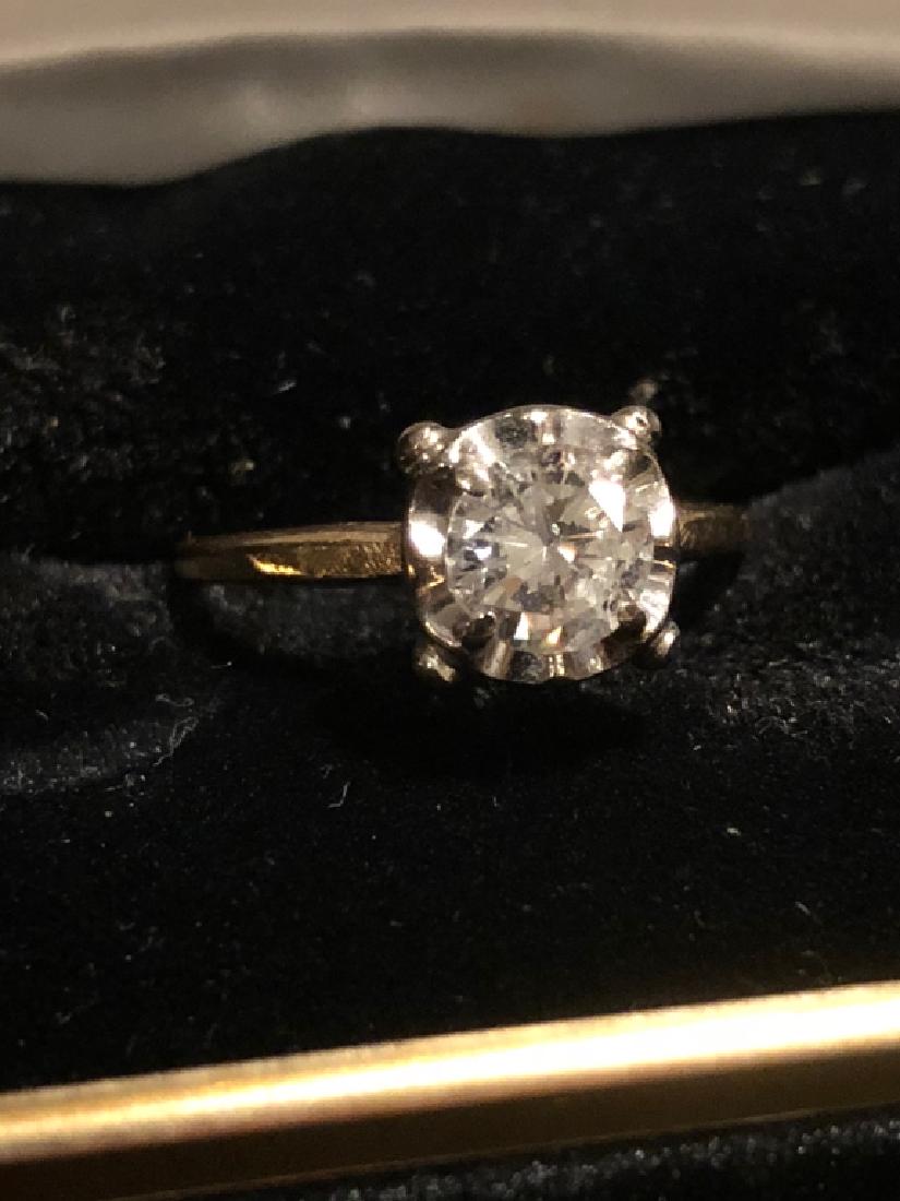 Round Solitaire Diamond 2/3's ct. in 14K gold Band (1 of 9)