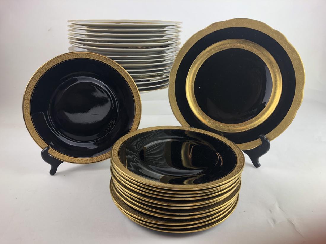 Stunning Set of Black Plates w/ Gold Trim