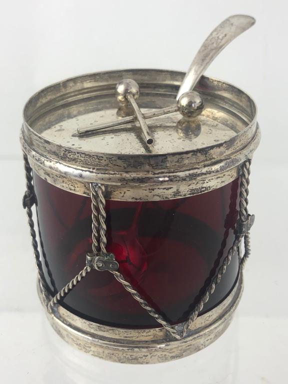 Rare 1900 Ruby Red & Sterling Drum Condiment Jar: A wonderful rare 1900's American sterling silver and red ruby glass Drum form Jam, Honey Pot, Condiment Jar with sterling silver spoon. Circa. 1930's. Lid is topped with two drumsticks used as the top