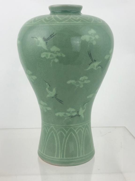 Celadon Glazed Ceramic Signed Korean Crane Vase: Vintage 10" Celadon Green Glazed Ceramic Pottery with Cranes & Clouds inlay Design.. Korean Vase Signed. Measures 10" high x 5" diameter