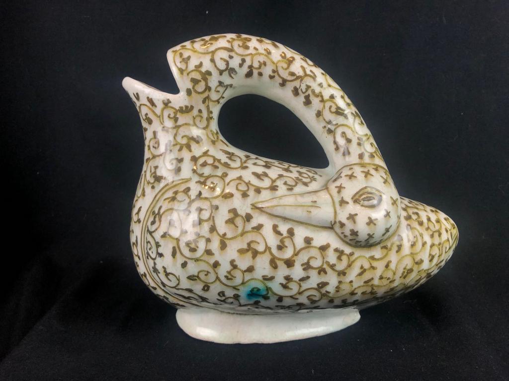 Rare Antique Iran Ceramic Swan Pitcher: Very unusual stone paste Ceramic Swan Pitcher, vintage label made in Iran. Wonderful Form. Measures: 9" wide x 8-1/2 tall