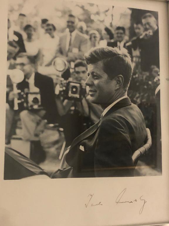 Rare Photo JFK Jack Kennedy Autograph Signature: Rare JFK Jack Kennedy Autograph Signature on Black & White Photo of him sitting in a chair outdoors with people and photographers in background. 8x10 picture.