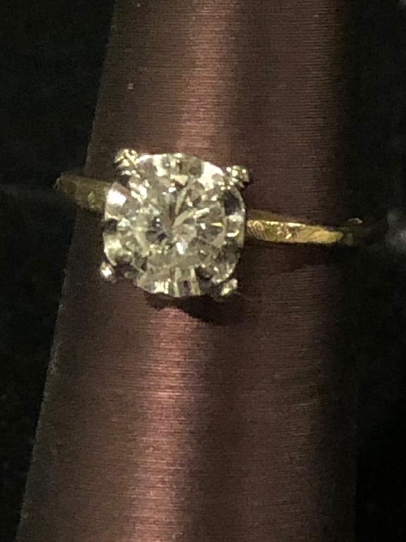 2/3 ct Round Solitaire Diamond Engagement Ring: Round Single Solitaire Diamond Engagement Ring set in a white gold 4 Prong Setting in a 14K yellow gold Band, 14K. Approx. 2/3ct Size 5