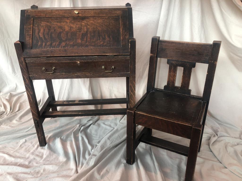 Mission Arts & Crafts Drop Front Desk w/ Chair: Antique Mission Style Secretary Desk and Chair. This slant , drop down desk top opens to reveal storage compartments of different sizes. Wood appears to be tiger oak. Wonderful sturdy matching styled 