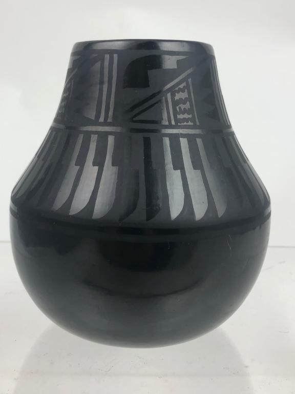 Signed San Ildefonso Pueblo Blackware Pottery Jar: San Ildefonso Pueblo Black Pottery Jar . Signed by famed Potter Florence Naranjo. San Ildefonso Pue 1991 Traditionally hand built with native clay, perfectly stone burnished then slip painted, pit fir