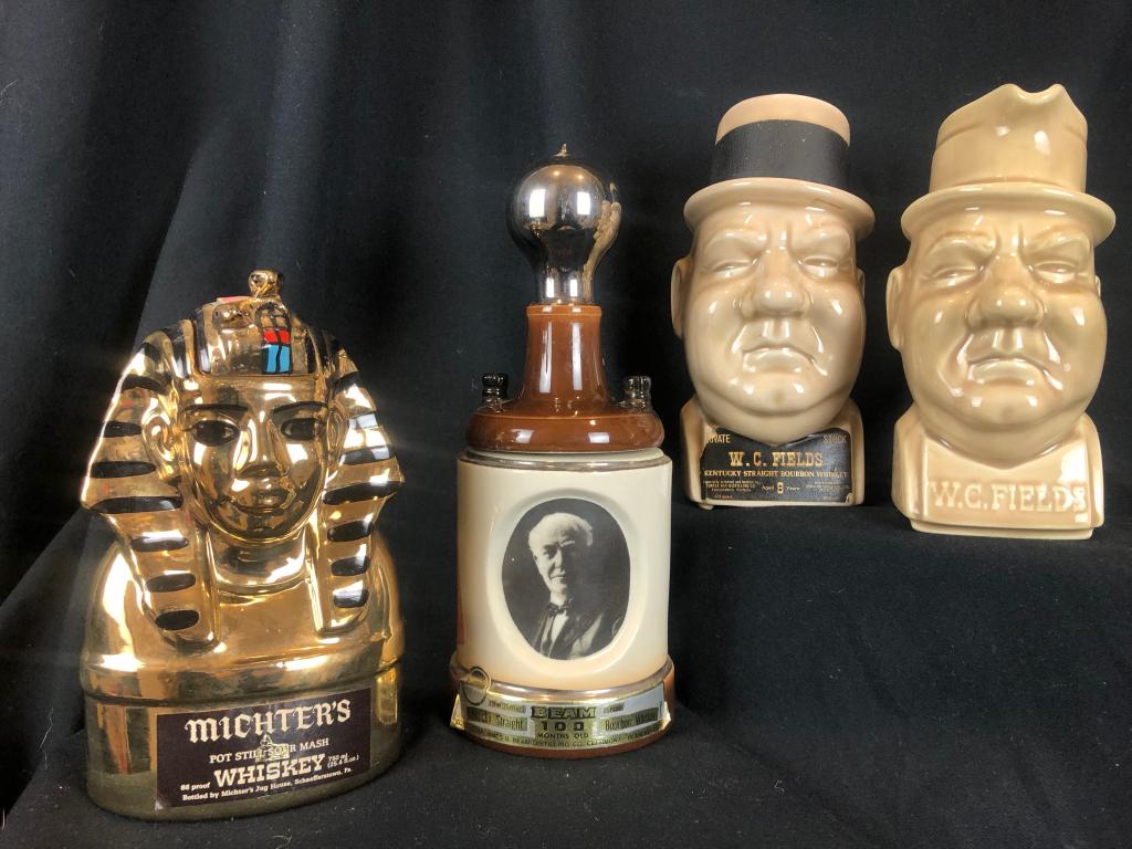 Lot of 4 Rare Vintage Whiskey Bottle Decanters: Rare Jim Beam Thomas Edison 100 yr. Commemorative Bourbon Whiskey Bottle, W.C. Fields Barwear Set including the Whiskey Decanter & Pitcher and a 1978 Michters King Tut Fine Tutankhuamun Decanter. Grea