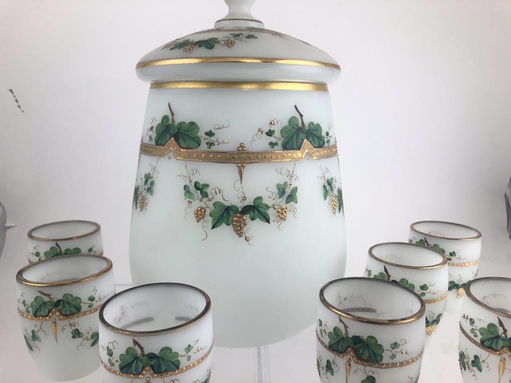 French Frosted Opaline 7 Glass Punch Set: Very attractive French Frosted Opaline Glass Punch Set, late 19th Century, enameled and gilded fruited grape leaf chains, cylindrical punch bowl with lid. 7 matching 3" high cups with applied handles.