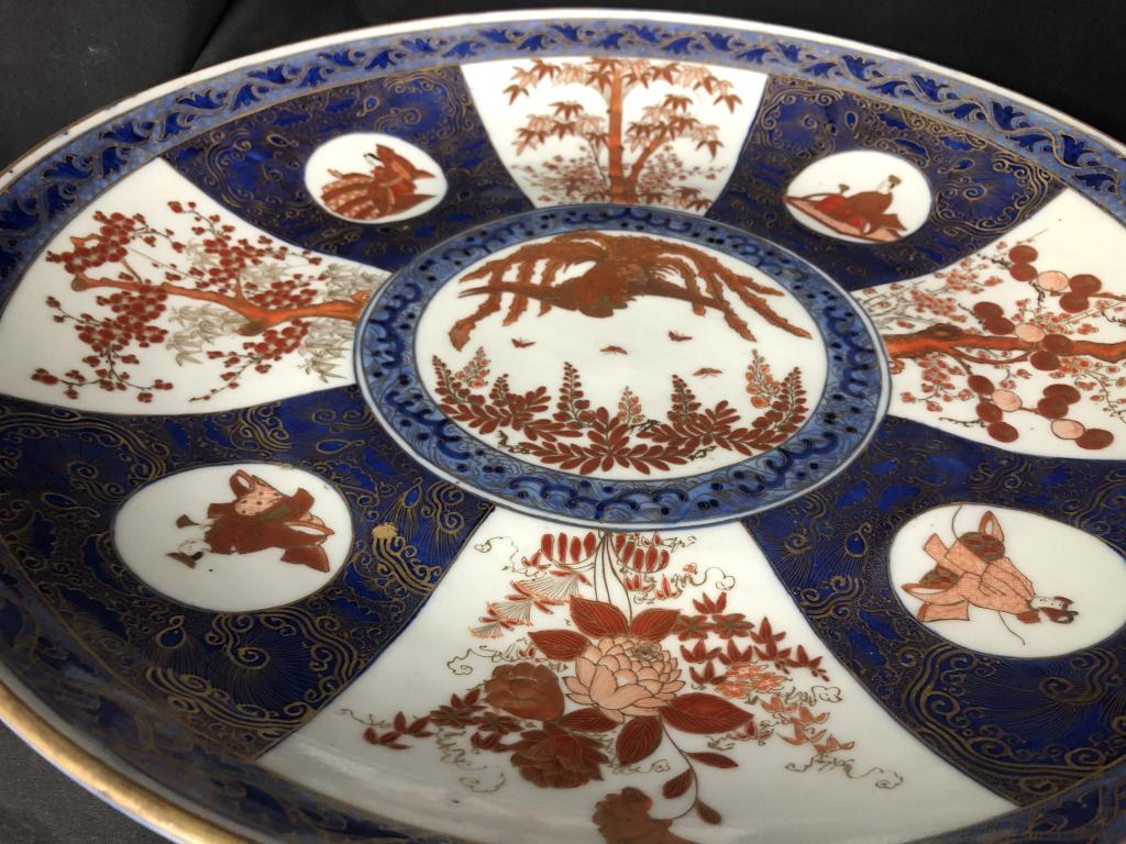 Rare Fabulous Lg. Antique Imari Porcelain Platter: Fabulous Large 16-1/2" Antique Japanese Imari Porcelain Navy, White, Browns and Gold gilt Charger Platter. Florals and Tree Design. Excellent Condition for age. No chips, cracks. Stamped on bottom.