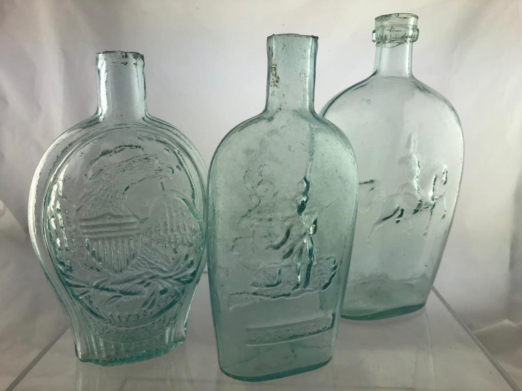 3 Historic Patriotic Flasks GI-117, GXIII-16,11: Three Historic Patriotic Flasks including 1) GI-117 Comparatively Scarce, Pint, Aqua, Columbia w/ Liberty Cap facing left "Kensington" / Large American Eagle "Union Co", Plain