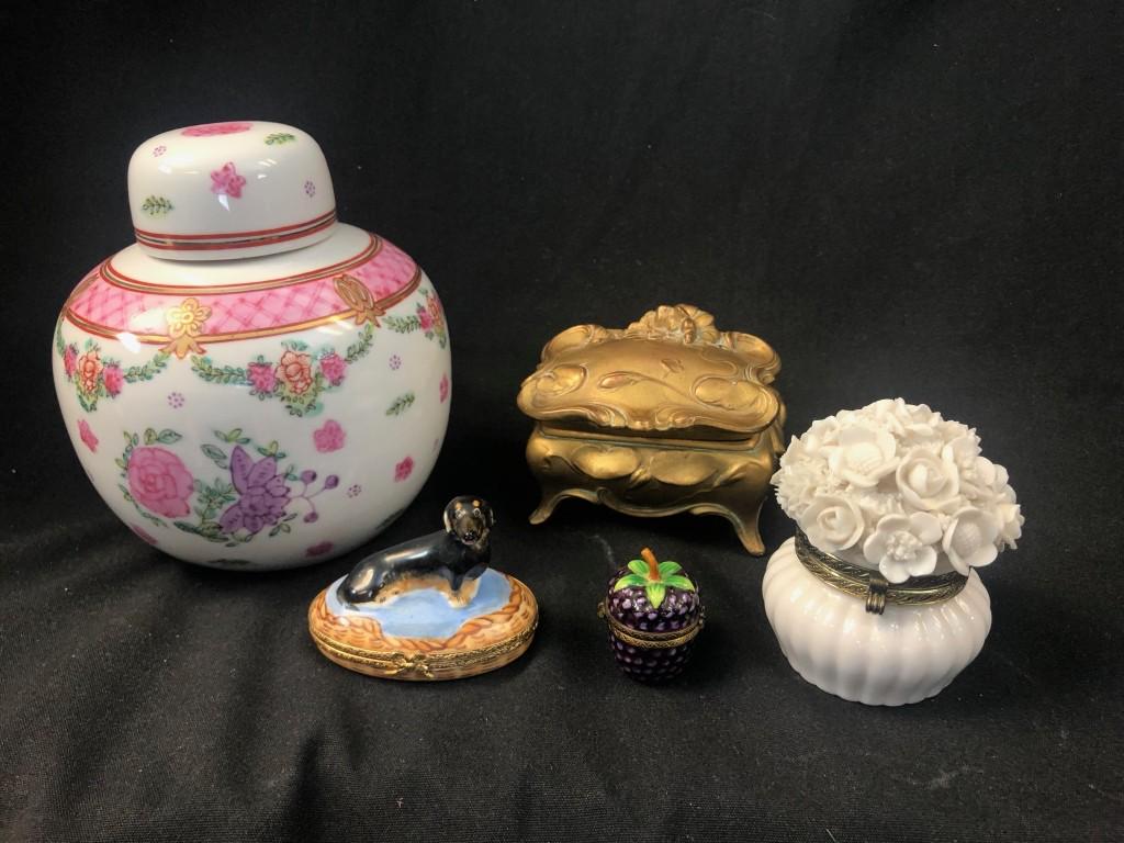 Lot of Limoges Trinket Boxes & Others: Lot of 5 porcelain and metal Trinket/Snuff Boxes, and a porcelain Urn. Limoges porcelain Blackberry and Dachshund Dog design. Also includes porcelain pink with gold accent covered urn, gold metal trin