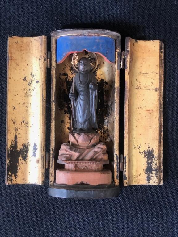 Japanese Antique Portable Miniature BuddhistShrine: Authentic Japanese Edo Period Traveling Portable Miniature Buddhist Shrine Zushi. Gold gilt and lacquered wooden case and metalwork. Two hinged double doors to reveal a carved image Kannon Bodhisattva