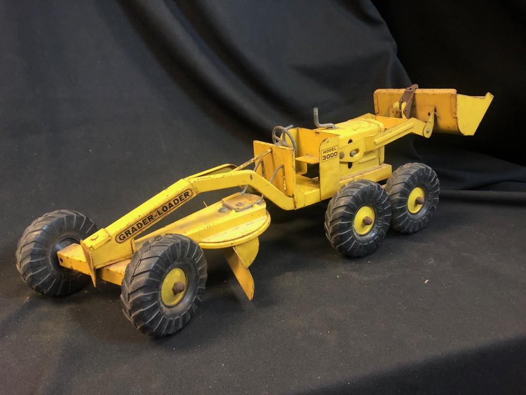 Nylint Road Grader Loader 3000 Pressed Steel Toy: 1950's Nylint Road Grader Loader 3000 Pressed Steel Construction Toy Vehicle. Grader Blade can be raised and lowered and turned, Steering works, Loader Bucket can be raised, lowered and locked in plac