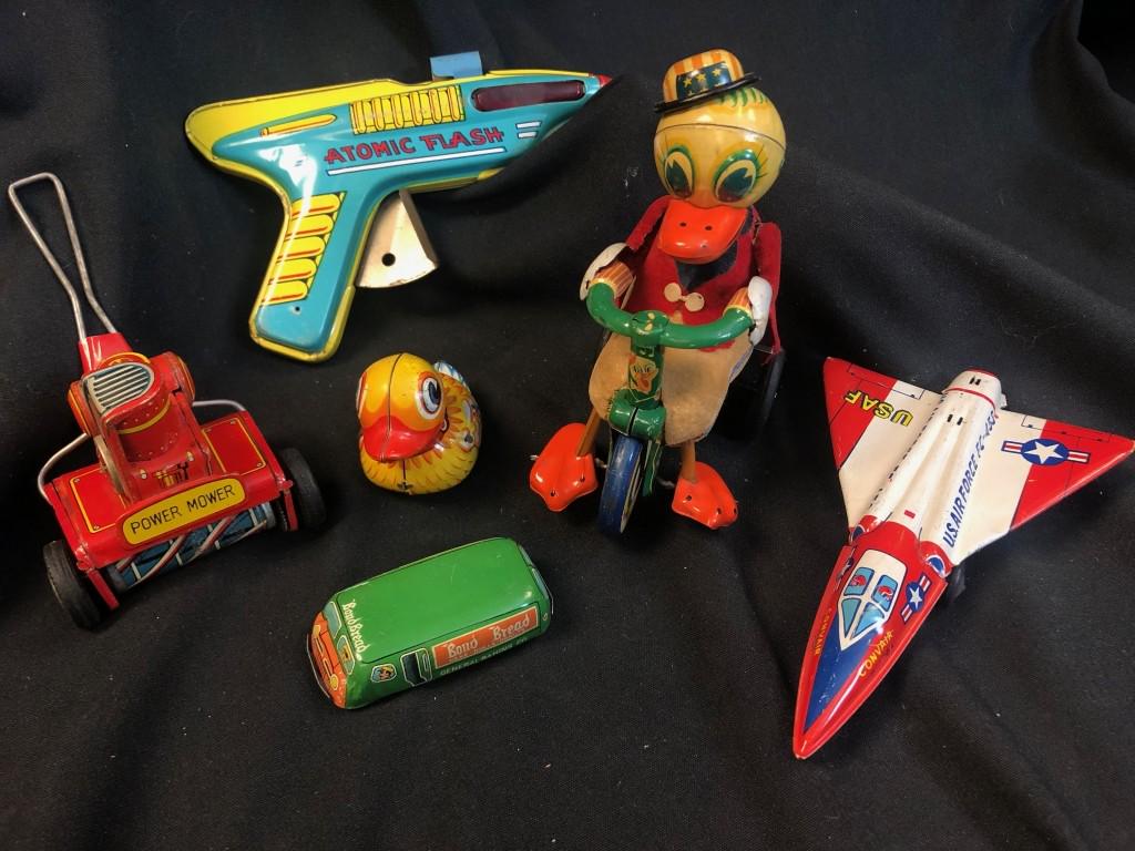 Lot of 6 Tin Litho Friction Vintage Toys: Lot of 6 Tin Litho Friction Vintage Toys....Including: Duck on Bike, Air force FX-453 Air plane, Power Cutting Mower, A small duck, Atomic Flash Gun, Bond Bread General Baking Co.Truck.