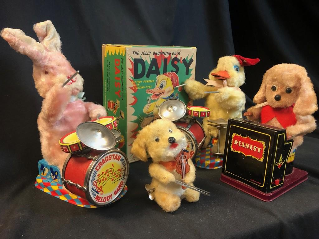 Lot of 4 Musical Animals Battery & Windup Toys: Cragstan Melody Band : The Jolly Drumming Duck with Box, and Bunny Drummer, Dog Pianist Made in Japan Battery Operated and Wind up Dog Violinist working. Includes 1958 pictures of two young children p