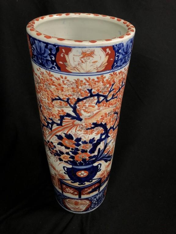 Lg. Imari Porcelain Umbrella Stand c.1850: Japanese Imari Umbrella Stand, circa 1850 porcelain with Imari Palette Decorations. Cylindrical Form with a wide central band depicting an urn of flowers flanked by wide floral boarders. Imari Large C