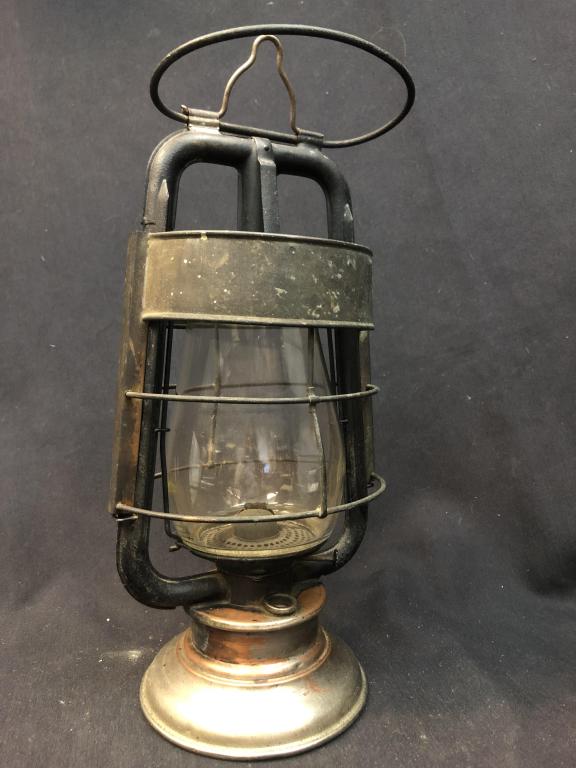 Rare Steam Gauge & Lantern Co. Fireman's Lamp: Rare antique Steam Gauge & Lantern Co. Fireman's style lantern with black metal frame & drop down cage, copper plated base. Measures: 7" x 14"
