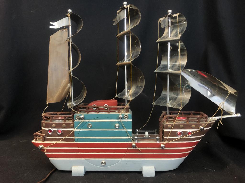 Unique Vintage 3 Metal Mast Wooden Ship NightLight: Unusual & so cool...vintage working night light in painted wood ship with three metal masts and sails. Very nice detail, two red lights activated by push switch. Wonderful for a lake house, ocean hous