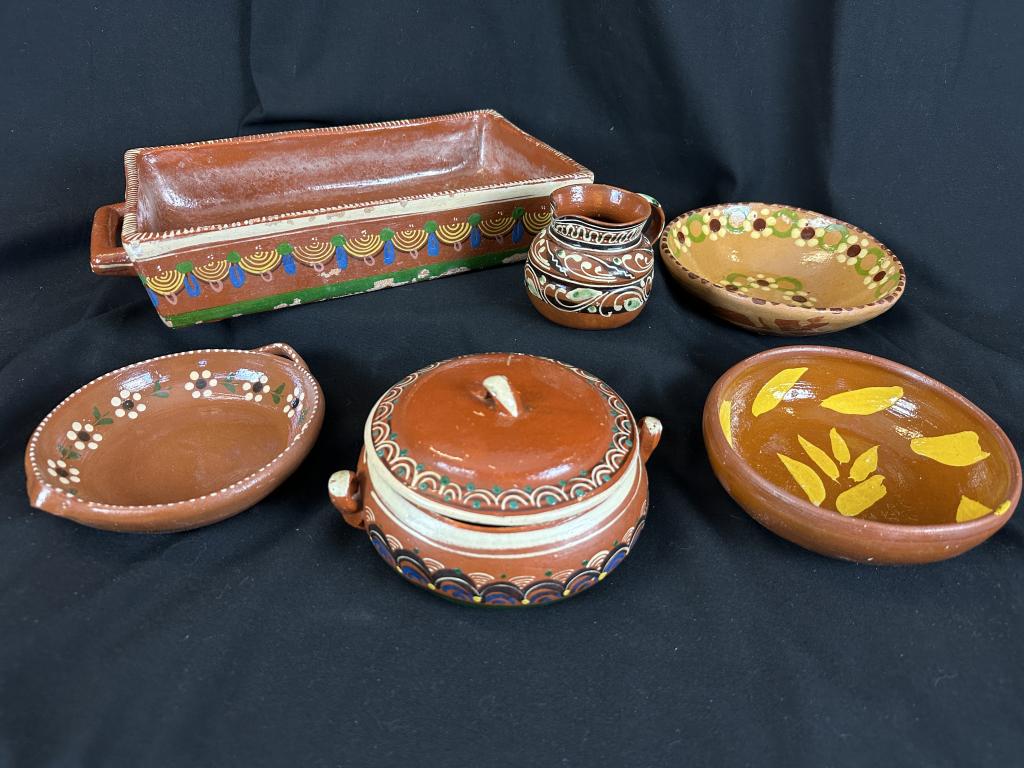 Lot of 6 Vintage Mexican TerraCotta RedwarePottery: Six pieces of vintage MCM Mexican Terra Cotta Redware Pottery. Handmade & hand painted pottery. 1.) Round handled lidded 5-1/2" w dish. 2.) Small 3" h "Made in Mexico" pitcher. 3.-5) Three 6" w shallo