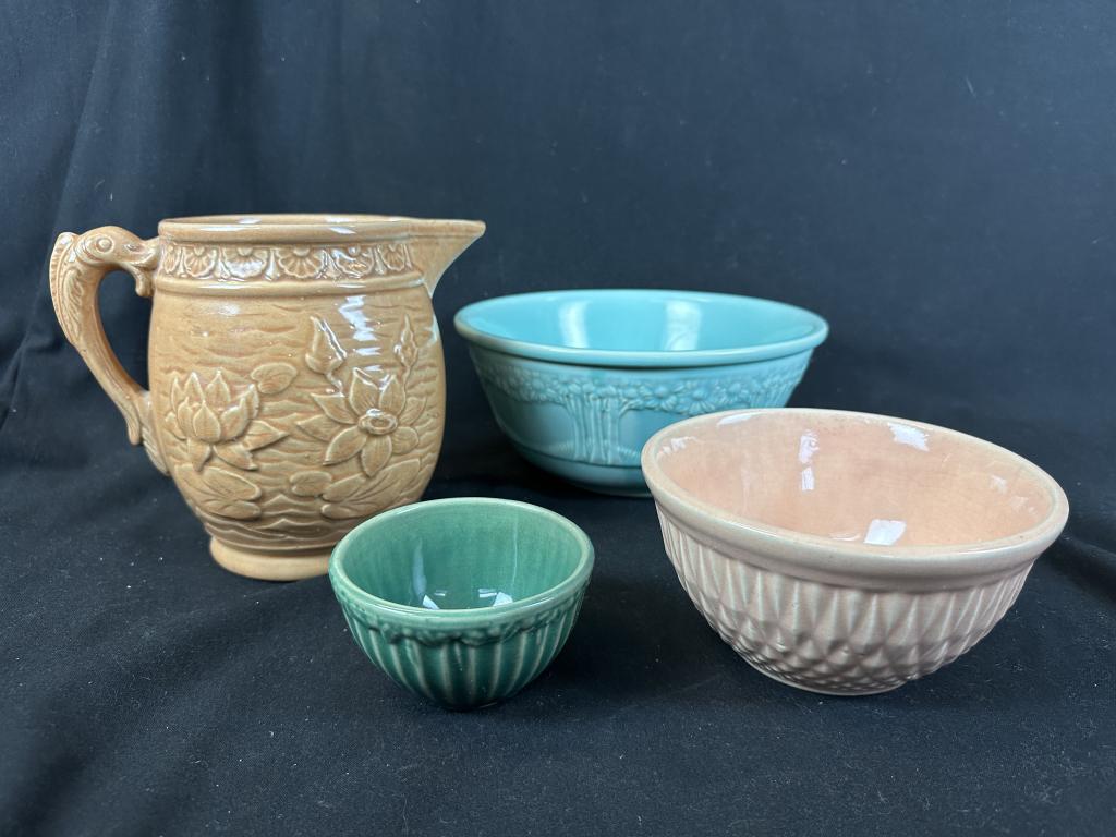 3 Vintage Glazed Stoneware Bowls & 1 Pitcher: 3 Vintage Ceramic Glazed Stoneware Bowls & 1 Pitcher: (McCoy / Hull / Homer McLaughlin) 1) One vintage McCoy Lotus 7" h apricot glazed ceramic pitcher marked "30" on base. 2-5) Three nested bowls in m