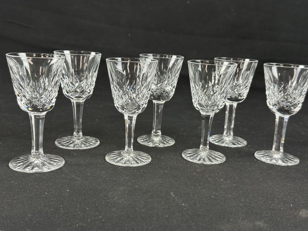 Waterford Set of 7 "Lismore" Cordial Glasses: Waterford Set of 7 "Lismore" Cordial Glasses. Measures 3-1/2" tall x 1-1/8" diameter. Etched with "Waterford".