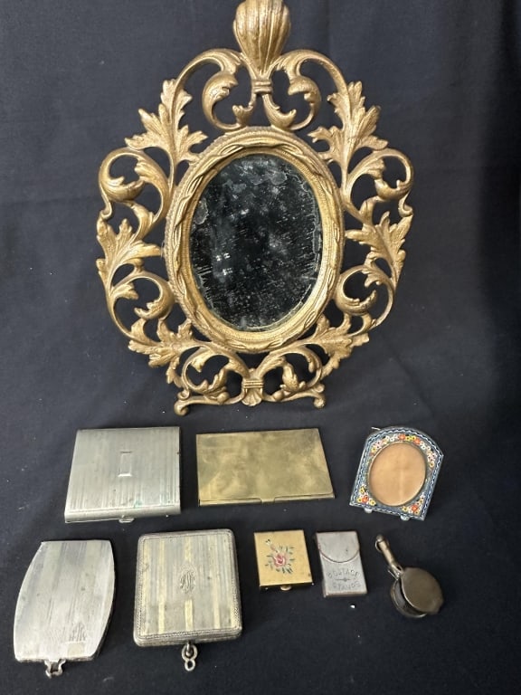 Victorian Ladies Compacts, Cases & Accoutrements: Lot of 9 Ladies Compacts, Cases & Accoutrements. Includes: 2 compacts, 2 cases, a pill box, a postage stamp box, a small round magnifier, a small miniature mosaic floral picture frame and a cast metal