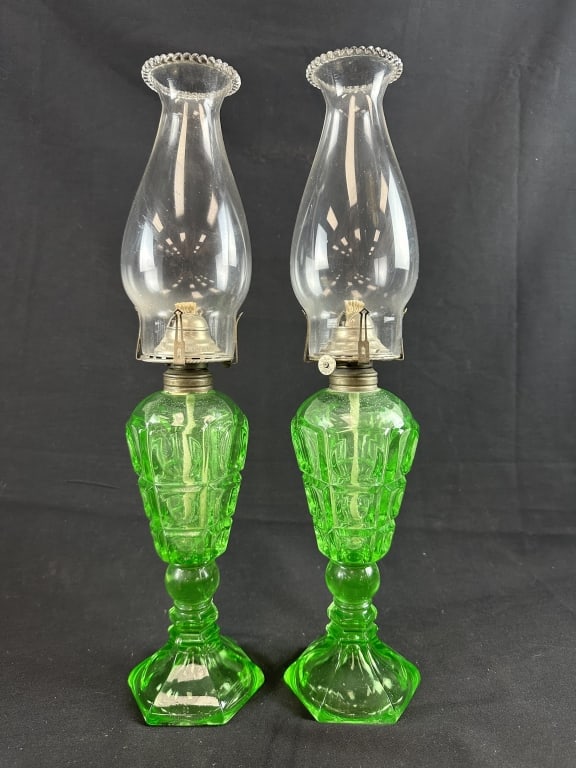 Pair of Emerald Green Uranium Glass Whale Oil Lamp: Fabulous Pair of Vintage Emerald Green Uranium Depression Glass Vaseline Whale Oil Lamps. Mosser? Measures approx 11-1/2" tall 3-1/2" diameter base. Illuminates under black light.