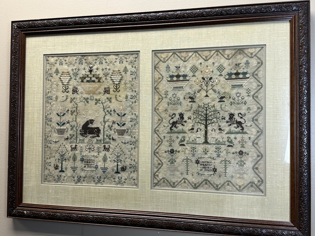 c1800s Needlepoint Embroidered Sisters Samplers: Two beautifully stitched samplers, side by side. One sampler was done by Ann Seggers aged 10 years, the other done by Sarah Seggers aged 13 years. Both contained in one grand wooden frame with beautif
