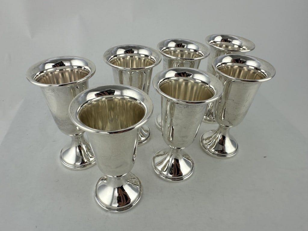Set of 7 Weighted 3" Sterling Cordial Glasses: Set of 7 Weighted 3" Sterling Cordial Glasses Set of seven weighted Sterling Silver cordial glasses. Measures: 3" x 1-1/2". Total Weight: 6.65 troy oz.