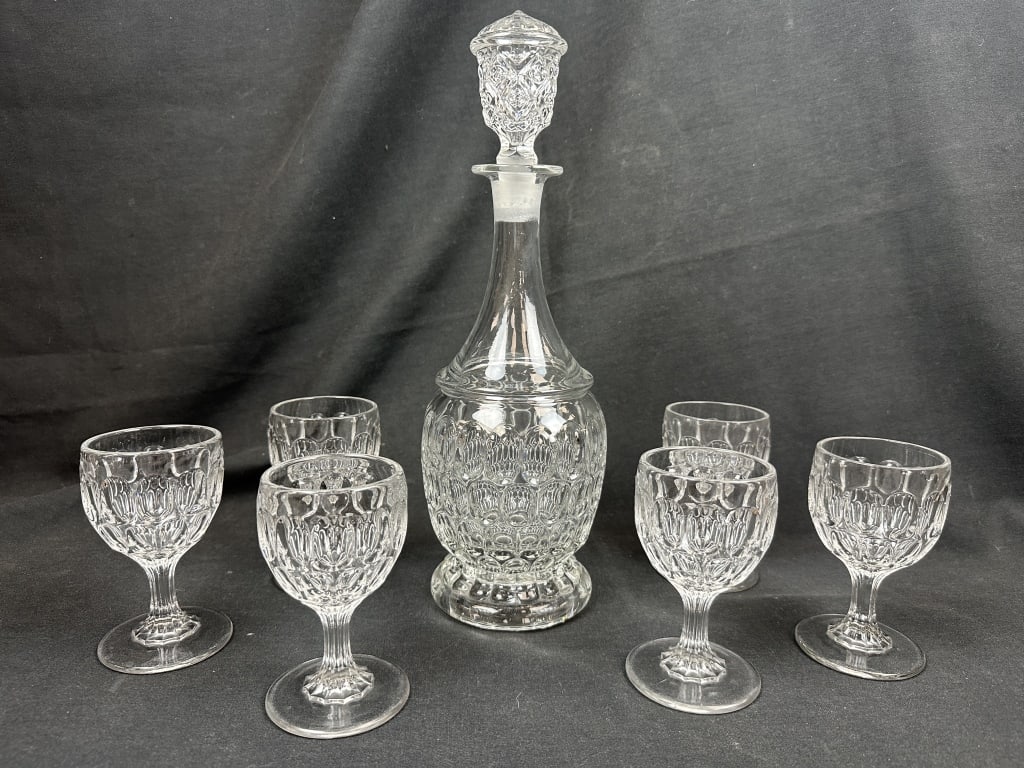 Thumbprint Crystal Decanter & 6 Wine Glass: Thumbprint Crystal Decanter & 6 Wine Glass Set of antique thumbprint crystal Decanter and 6 Wine glasses. Includes: 1 footed decanter with stopper. Measures: 4-1/4" x 11", 14-1/2" w stopper. Set of 6 