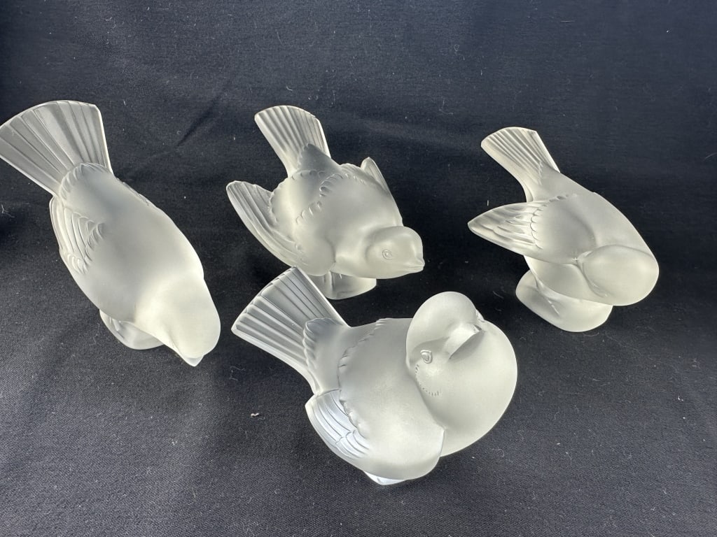 4 Lalique Frosted Cut Crystal Sparrows (1 of 2): 4 Lalique Frosted Cut Crystal Sparrows (1 of 2) Lot of four frosted Lalique cut crystal sparrow figurines / paperweights in different positions. made by Lalique of France. Signed on base. Group 1 of 2