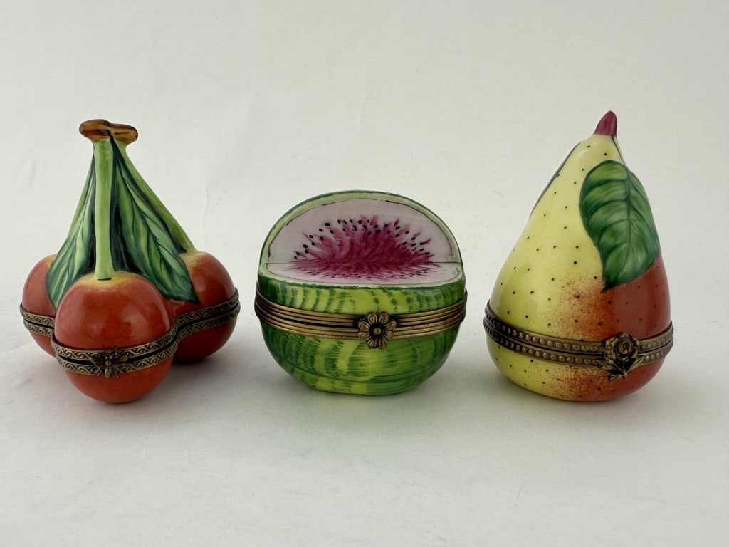3 Porcelain Limoges France Small Fruit Boxes: 3 Porcelain Limoges France Small Fruit Boxes 3 Porcelain Limoges France Small Fruit Boxes. Lot of three hinged fruit boxes made by Limoges of France. 1.) Cherries 2-1/2" x 3"; 2.) Watermelon 2" x 2";