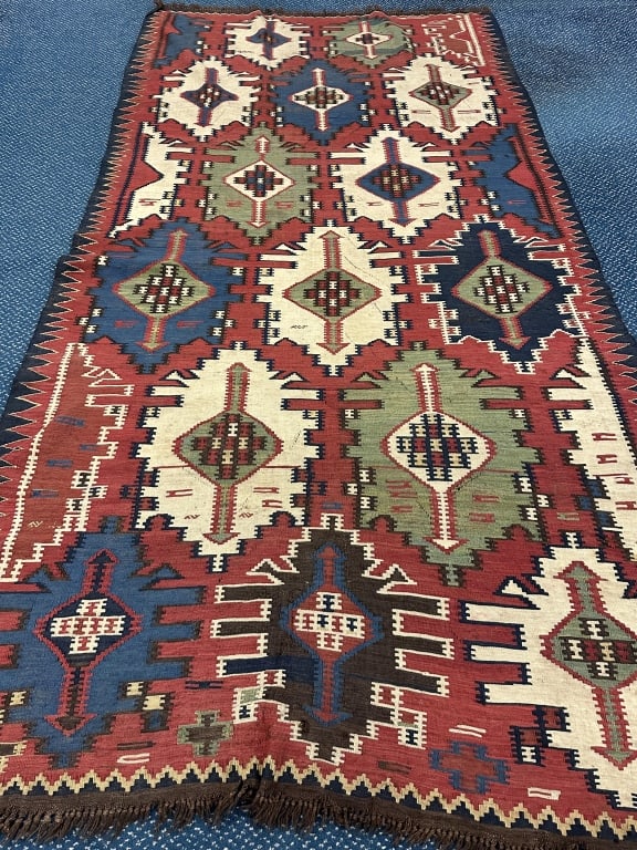 Antique Handwoven Kuba Kilim Oriental Area Carpet: Antique Handwoven Kuba Kilim Oriental Area Carpet Oriental Kuba handmade area carpet rug from mid 19th century. Features designs in Blue, Sage Green, Cream, Red, and Orange. Measures: Pile 58" x 117" 