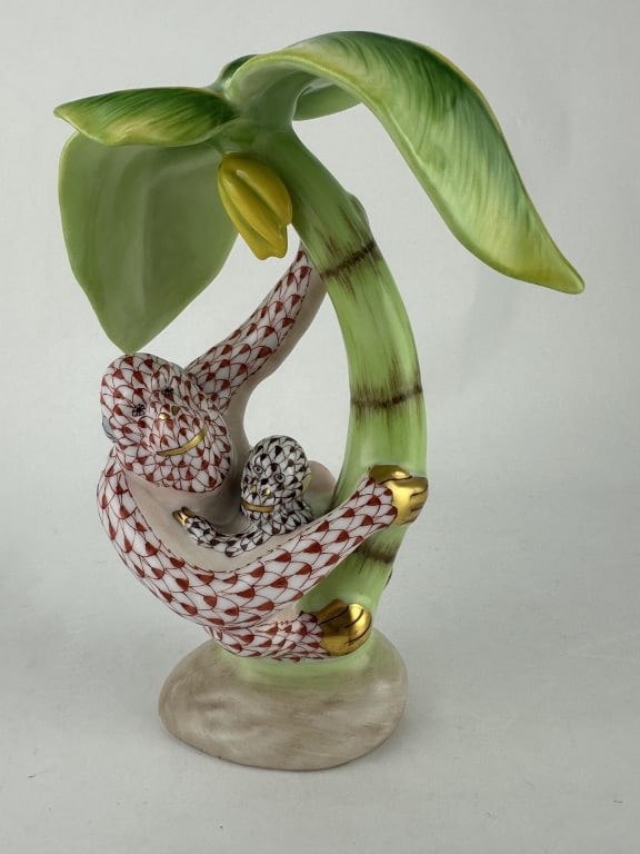 Rare Herend Orangutan Kingdom Classic 15227: Rare Herend Orangutan Kingdom Classic 15227 Rare Herend orangutan and baby hanging from banana tree in red (VH) and brown (VHBR) fishnet pattern with natural and 24k accents. Limited piece made by Her