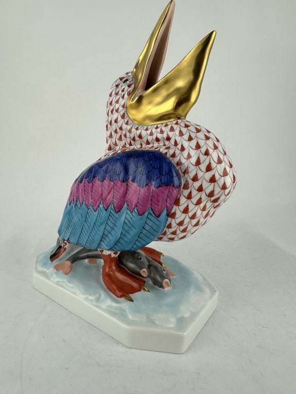 Herend Pelican w Fish Red Porcelain 5073: Herend Pelican w Fish Red Porcelain 5073 Handpainted Herend porcelain pelican in red (VH) fishnet pattern with multi-color and 24k gold accents. Made by Herend of Hungary. Marked "205". Measures: 8-3/