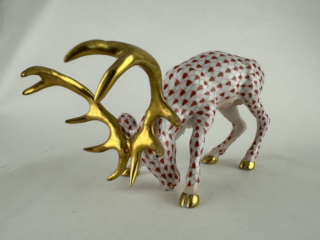 Herend Deer/Stag Red Porcelain 15593: Herend Deer/Stag Red Porcelain 15593 Handpainted Herend porcelain deer/stag with head lowered in red (VH) fishnet pattern with 24k gold accents. Made by Herend of Hungary for their Forest Animals Coll