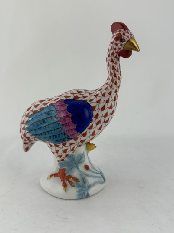 Herend Guinea Fowl 2 of 2 Red Porcelain 5011: Herend Guinea Fowl 2 of 2 Red Porcelain 5011 Handpainted Herend porcelain guinea fowl on floral base in red (VH) fishnet pattern with multi-color and 24k gold accents. Made by Herend of Hungary. Marke