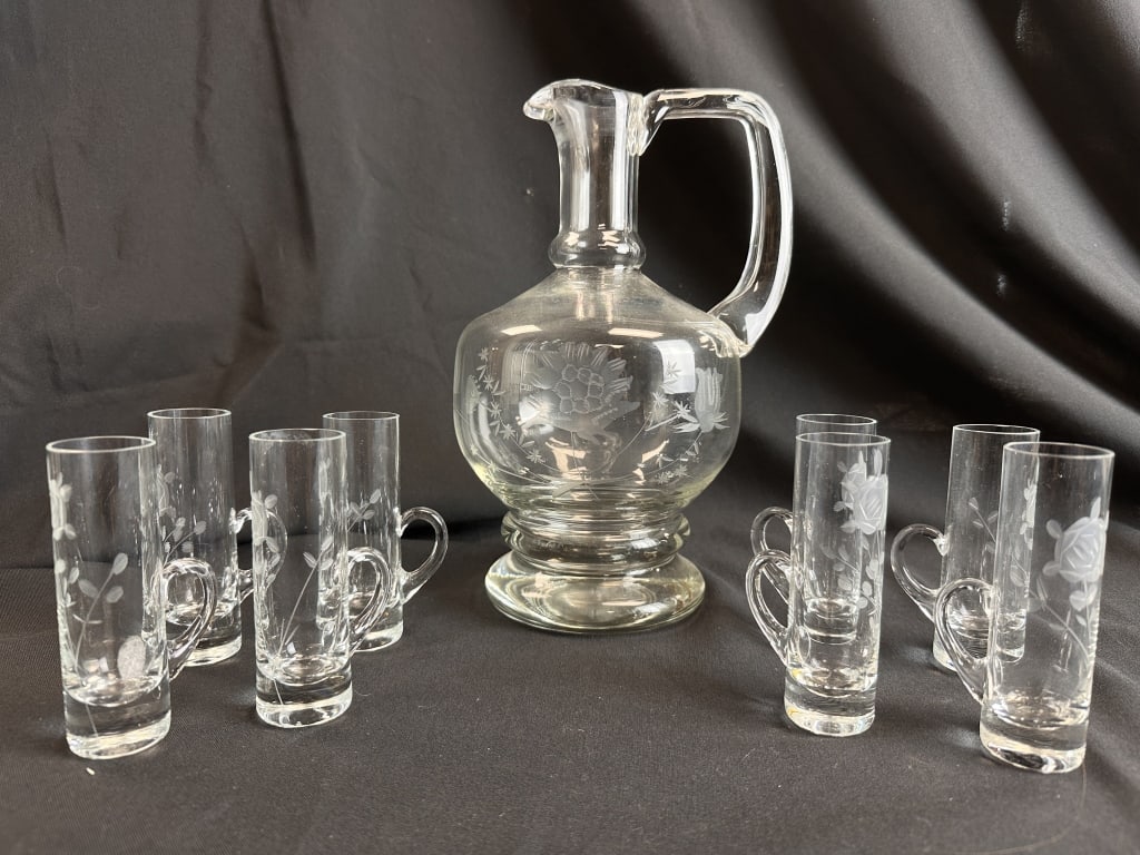 Set of 8 Handled Shot Liqueur Glasses & Decanter: Matching Set of 8 vintage floral etched crystal handled cordial liqueur 4" shot glasses and a 9-3/4" matching handled liquor pitcher decanter. Very nice set for a bar cart or bar area. Unique handled