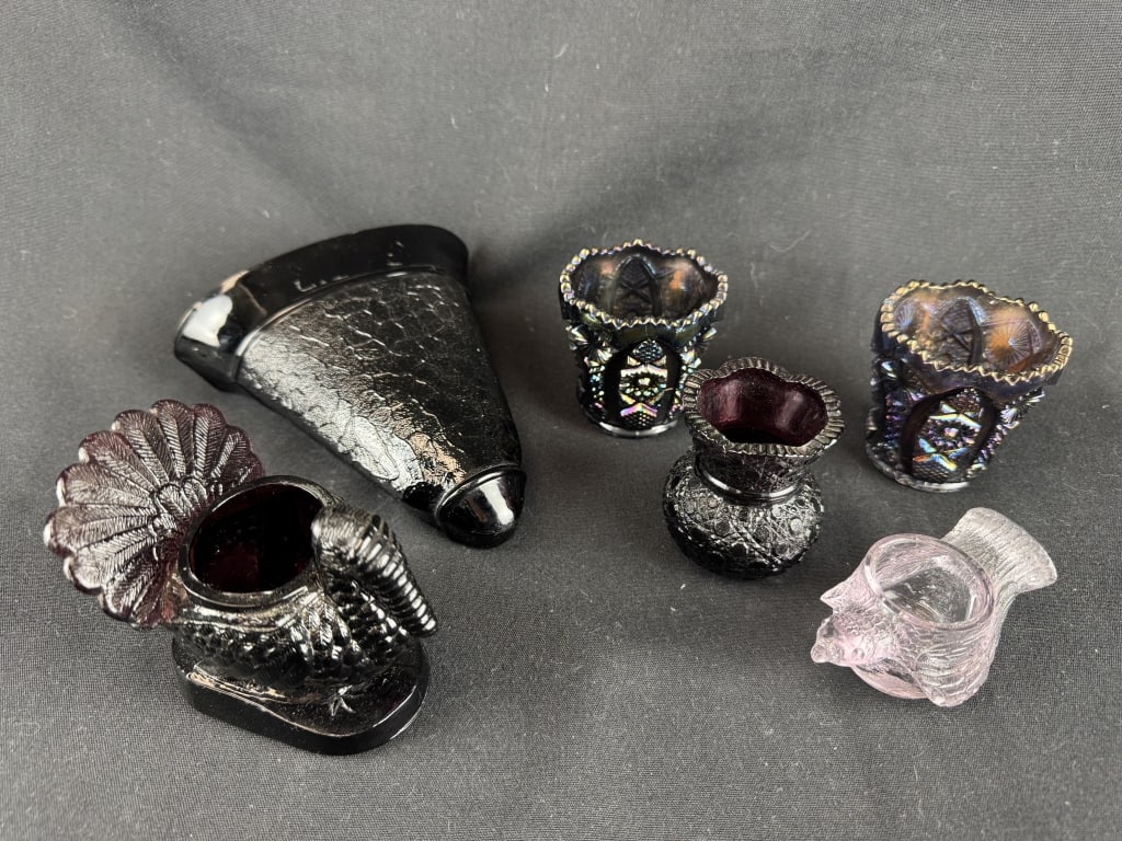 6 pcs Amethyst Vintage Pressed Glass Pieces: Lot of 6 vintage amethyst purple & black pressed glass pieces. Includes: 1 black glass textured wall pocket, 6" x 2-1/2" x 5-1/4"; 3 toothpick holders including 2 carnival glass, 3"; 1 turkey toothpic
