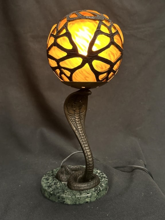 Rising Cobra Caged Glass Art Nouveau Lamp 1of2: Art Nouveau style caged glass lamp supported by sculptural cast metal rising cobra snake on marbled stone base. Globe shaped satin glass shade is caged by butterfly motif metal on patinaed snake body.