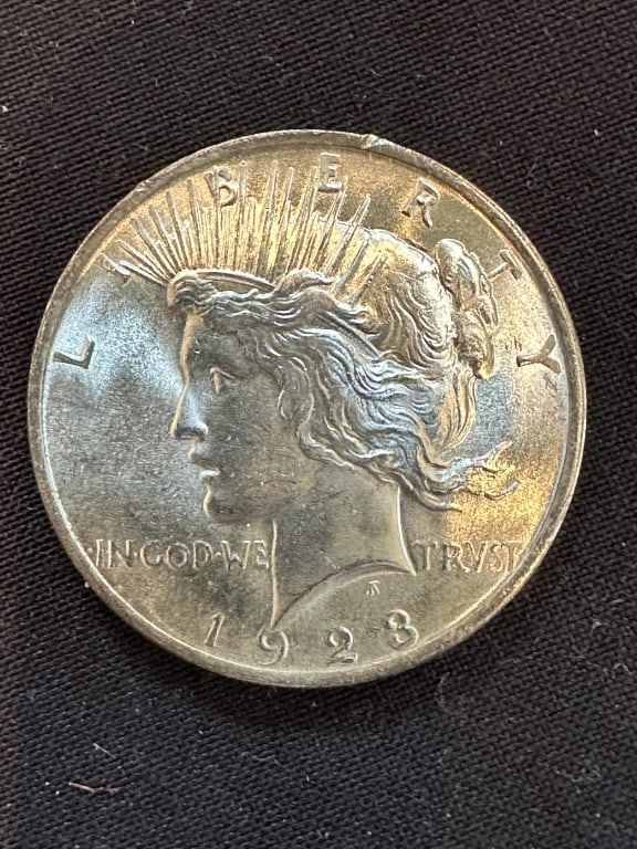 1923 Silver Peace Dollar - BU. (1 of 3)