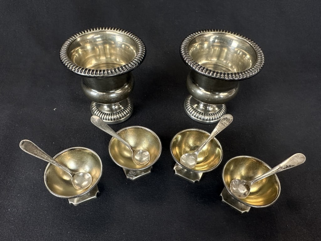 10pc Sterling Salts & Toothpick Urns 6.355 troy oz: An antique lot of 10 neoclassical sterling silver pieces, consisting of a set of four sterling salt cellars with sterling spoons, as well as a pair of toothpick holder urns. Includes: 1.) 2 Hallmark t