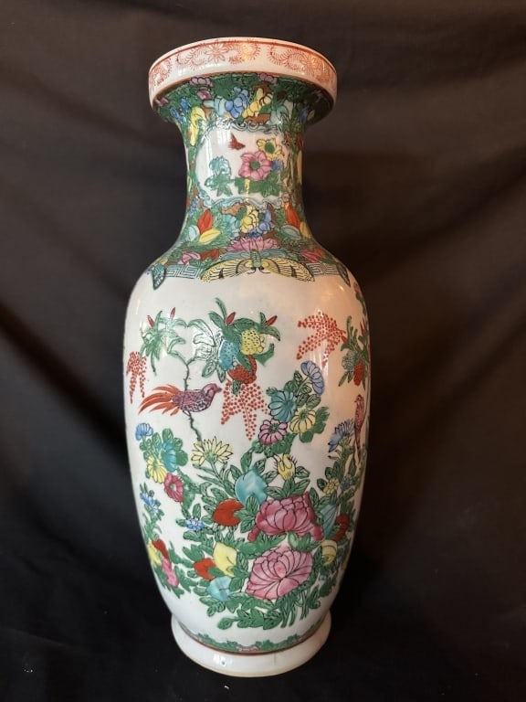 Chinese Famille Rose Handpainted Porcelain Vase: A tall 18" Chinese export Famille Rose porcelain vase with hand-painted floral and bird motif. The piece features over glaze enamels in vibrant colors, with shades of pink used for the birds and flowe