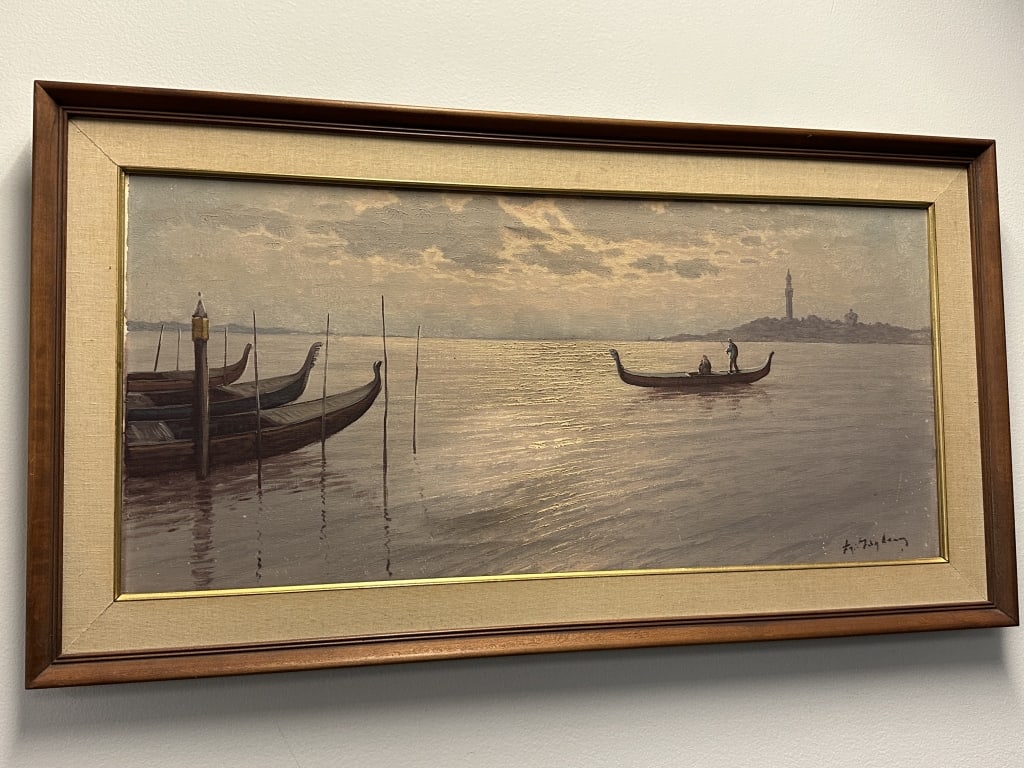 Signed Oil on Canvas Venice Waterscape w/Gondolas: A framed oil on canvas landscape painting, depicting gondolas on the water in Venice. The piece is signed by the artist on the lower right, but the signature is illegible. Measures: Frame: 37" x 20";