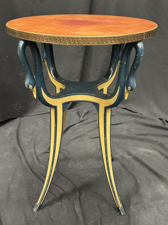 Imperial Furniture Swan Motif Table Leather Top: Striking vintage side table by Imperial Furniture Company, featuring a round leather inset top framed by a pierced bronze gallery. The painted pedestal base is uniquely designed with stylized swan hea